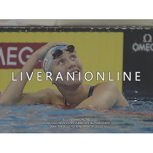 (110728) -- SHANGHAI, July 28, 2011 () -- Anastasia Zueva of Russia looks at the scoreboard after the final of women\'s 50m backstroke swimming event at the 14th FINA World Championships in Shanghai, east China, July 28, 2011. Anastasia Zueva of Russia claimed the title with 27.79. (/Fan Jun) (zgp)