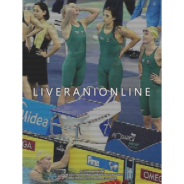(110728) -- SHANGHAI, July 28, 2011 () -- Swimmers of Australia react after the final of women\'s 4x200m freestyle swimming event at the 14th FINA World Championships in Shanghai, east China, July 28, 2011. The team of Australia won the silver medal with 7:47.42. (/Chen Fei)