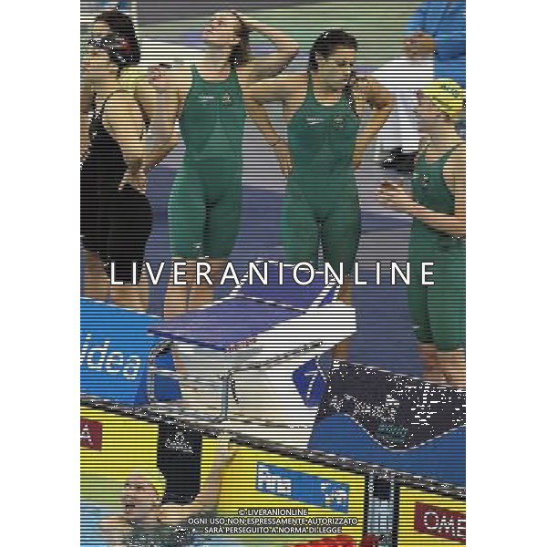 (110728) -- SHANGHAI, July 28, 2011 () -- Swimmers of Australia react after the final of women\'s 4x200m freestyle swimming event at the 14th FINA World Championships in Shanghai, east China, July 28, 2011. The team of Australia won the silver medal with 7:47.42. (/Chen Fei)