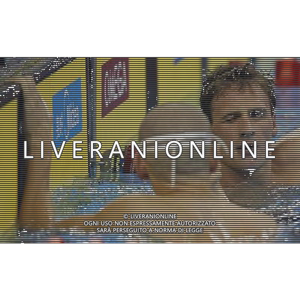 (110728) -- SHANGHAI, July 28, 2011 () -- Ryan Lochte (R) of the United States reacts after the final of men\'s 200m individual medley swimming event at the 14th FINA World Championships in Shanghai, east China, July 28, 2011. Ryan Lochte claimed the title and set a new world record with 1:54.00. (/Fei Maohua) (zgp)