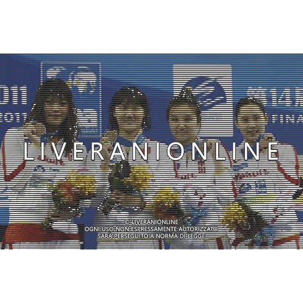 (110728) -- SHANGHAI, July 28, 2011 () -- Swimmers of China Tang Yi, Pang Jiaying, Liu Jing and Chen Qian (from L to R) pose in the awarding ceremony of women\'s 4x200m freestyle swimming event at the 14th FINA World Championships in Shanghai, east China, July 28, 2011. The Chinese team got the bronze medal with 7:47.66. (/Ren Long) (sqq)