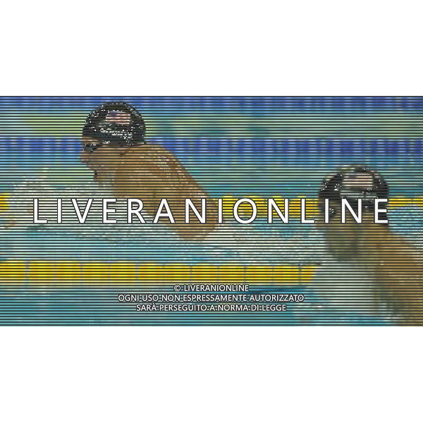 (110728) -- SHANGHAI, July 28, 2011 () -- Ryan Lochte (L) of the United States competes in the final of men\'s 200m individual medley swimming event at the 14th FINA World Championships in Shanghai, east China, July 28, 2011. Ryan Lochte claimed the title and set a new world record with 1:54.00. (/Yang Zongyou) (zgp)