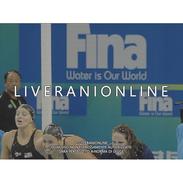 (110728) -- SHANGHAI, July 28, 2011 () -- Swimmers of the United States cheer for their teammate in the final of women\'s 4x200m freestyle swimming event at the 14th FINA World Championships in Shanghai, east China, July 28, 2011. The team of the United States claimed the title with 7:46.14. (/Yang Lei) (zgp)