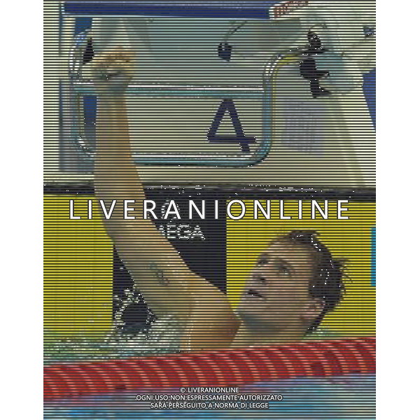 (110728) -- SHANGHAI, July 28, 2011 () -- Ryan Lochte of the United States celebrates after the final of men\'s 200m individual medley swimming event at the 14th FINA World Championships in Shanghai, east China, July 28, 2011. Ryan Lochte claimed the title and set a new world record with 1:54.00. (/Yang Zongyou) (zgp)
