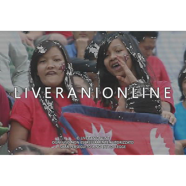(110728)--KATHMANDU, July 28, 2011 ()--Supporters of Nepalese National team cheer prior to the second leg of the FIFA World Cup Brazil 2014 football qualifying match between Nepal and Jordan in Nepali Capital Kathmandu on July 28, 2011. The game ended in a 1-1 draw in the second leg of the FIFA World Cup qualifiers. (/Niraj Sapkota)