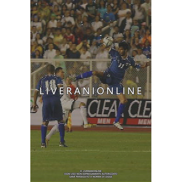 MANILA, July 28, 2011 () - Fahed Al Ebrahim (R) of Kuwait fights for the ball against Manuel Ott (C) of the Philippines during their qualifing match for the 2014 FIFA World Cup Brazil in Manila, Philippines, July 28, 2011. Kuwait won 2-1. (/Rouelle Umali)