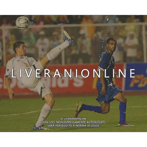 MANILA, July 28, 2011 () - Robert james Gier (L) of the Philippines fights for the ball against Bader Al Mutwa of Kuwait during their qualifing match for the 2014 FIFA World Cup Brazil in Manila, Philippines, July 28, 2011. Kuwait won 2-1. (/Rouelle Umali)