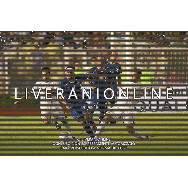 MANILA, July 28, 2011 () - Fahad Al Enezi (C) of Kuwait fights for the ball against Emelio Caligdong (L) and Stephan Schrock (R) of the Philippines during their qualifing match for the 2014 FIFA World Cup Brazil in Manila, Philippines, July 28, 2011. Kuwait won 2-1. (/Rouelle Umali)