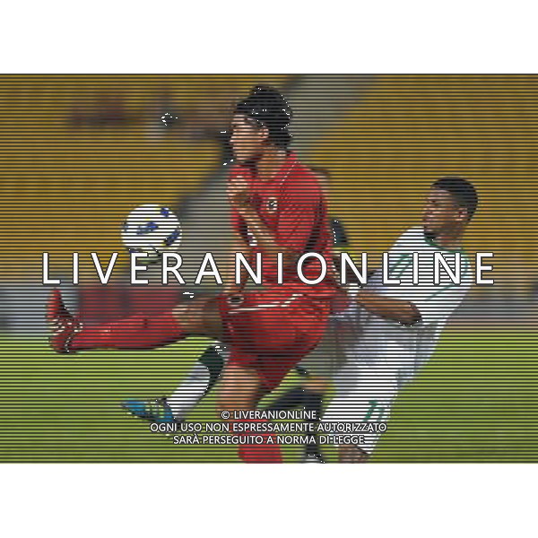 (110728) -- HONG KONG, July 28, 2011 () -- So Wai Chuen (L) of Hong Kong of China vies with Nassir Ali Alshamrani of Saudi Arabia during their second round of Asian qualifier match for the 2014 World Cup in Hong Kong, south China, July 28, 2011. Saudi Arabia defeated Hong Kong by 5-0. (/Lo Ping Fai)