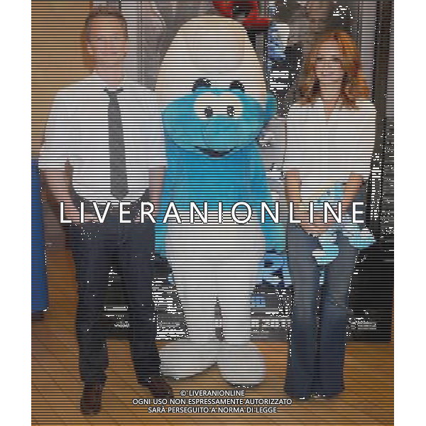 Neil Patrick Harris, Jayma Mays and Veronique Culliford visit the Build-A-Bear Workshop on July 27, 2011 in New York City.