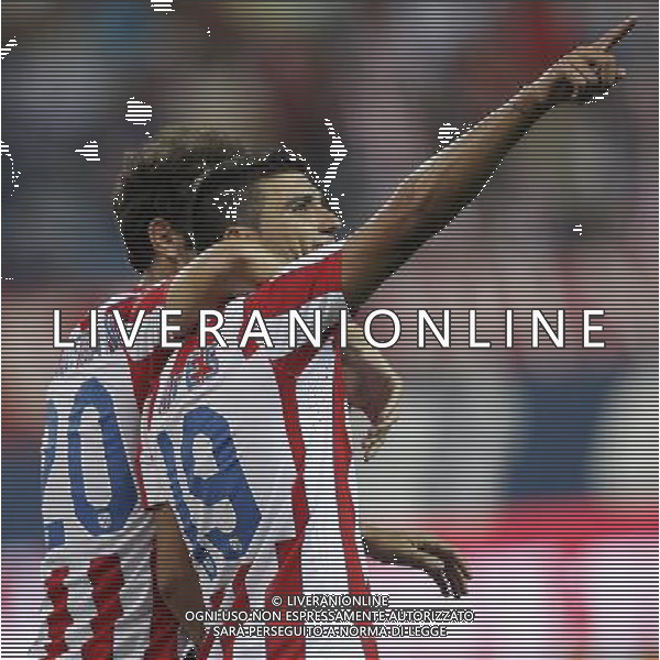 Madrid 28/07/2011.- Europa League preliminary round Atletico de Madrid vs Stromsgodset. Jose Antonio Reyes and Juanfran celebrating goal. Photo: Cesar Cebolla / ALFAQUI