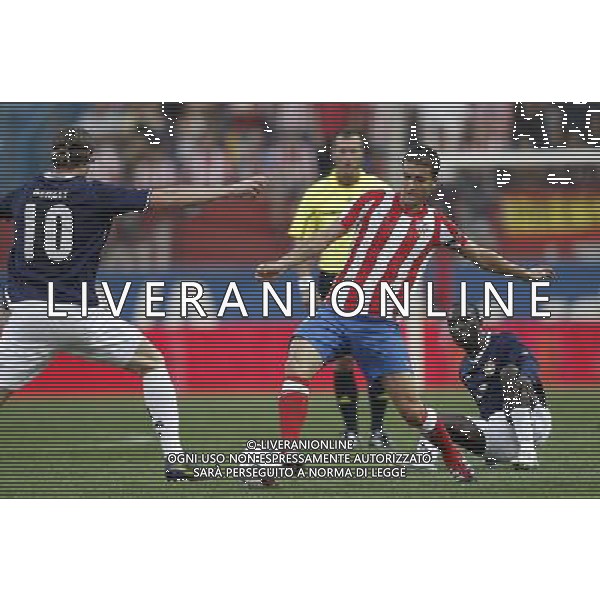 Madrid 28/07/2011.- Europa League preliminary round Atletico de Madrid vs Stromsgodset. Gabi and Sankoh. Photo: Cesar Cebolla / ALFAQUI
