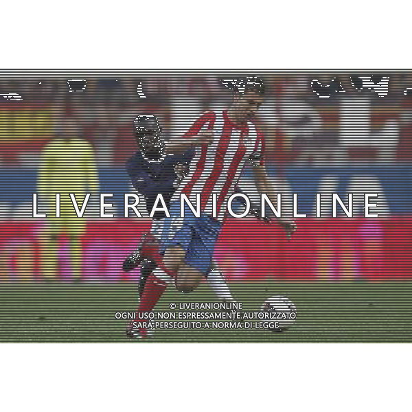 Madrid 28/07/2011.- Europa League preliminary round Atletico de Madrid vs Stromsgodset. Gabi and Sankoh. Photo: Cesar Cebolla / ALFAQUI