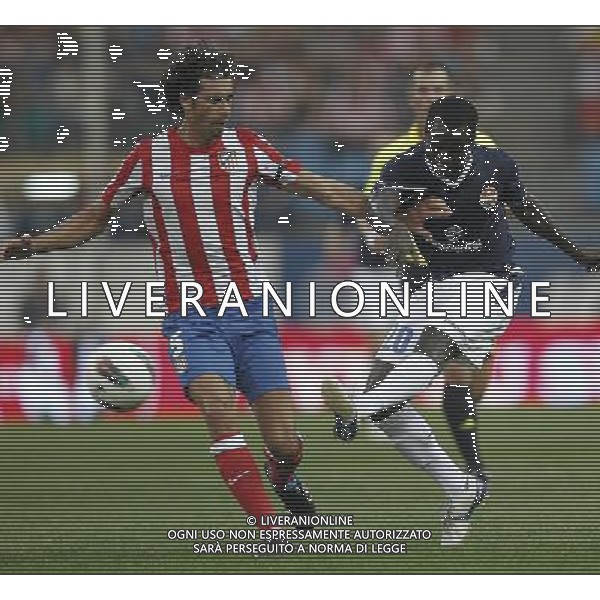 Madrid 28/07/2011.- Europa League preliminary round Atletico de Madrid vs Stromsgodset. Tiago and Abu. Photo: Cesar Cebolla / ALFAQUI