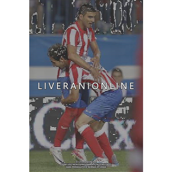 Madrid 28/07/2011.- Europa League preliminary round Atletico de Madrid vs Stromsgodset. Jose Antonio Reyes and Juanfran celebrate goal. Photo: Cesar Cebolla / ALFAQUI