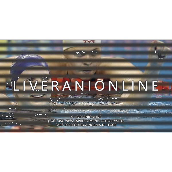(110730) -- SHANGHAI, July 30, 2011 () -- Rebecca Adlington (L) of Britain celebrates after the final of women\'s 800m freestyle swimming event at the 14th FINA World Championships in Shanghai, east China, July 30, 2011. Rebecca Adlington of Britain claimed the title with 8:17.51. (/Fei Maohua) (zgp) ©PHOTOSHOT/Agenzia Aldo Liverani Sas - ITALY ONLY - SHANGHAI: 14mi Campionati Mondiali di nuoto FINA World Championships.