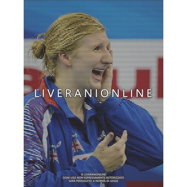 (110730) -- SHANGHAI, July 30, 2011 () -- Rebecca Adlington of Britain celebrates in the awarding ceremony of women\'s 800m freestyle swimming event at the 14th FINA World Championships in Shanghai, east China, July 30, 2011. Rebecca Adlington of Britain claimed the title with 8:17.51. (/Yang Zongyou) (sqq)
