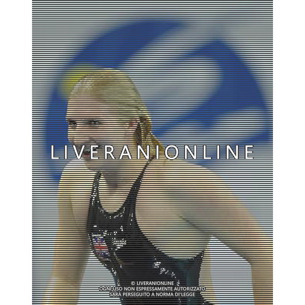 (110730) -- SHANGHAI, July 30, 2011 () -- Rebecca Adlington of Britain reacts after the final of women\'s 800m freestyle swimming event at the 14th FINA World Championships in Shanghai, east China, July 30, 2011. Rebecca Adlington of Britain claimed the title with 8:17.51. (/Yang Zongyou) (zgp)