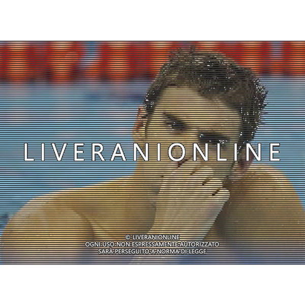 (110730) -- SHANGHAI, July 30, 2011 () -- Michael Phelps of the United States reacts after the final of men\'s 100m butterfly swimming event at the 14th FINA World Championships in Shanghai, east China, July 30, 2011. Michael Phelps claimed the title with 50.71. (/Fei Maohua) (zgp)