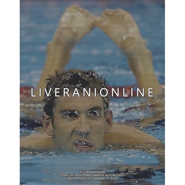 (110730) -- SHANGHAI, July 30, 2011 () -- Michael Phelps of the United States reacts after the final of men\'s 100m butterfly swimming event at the 14th FINA World Championships in Shanghai, east China, July 30, 2011. Michael Phelps claimed the title with 50.71. (/Fei Maohua) (zgp)