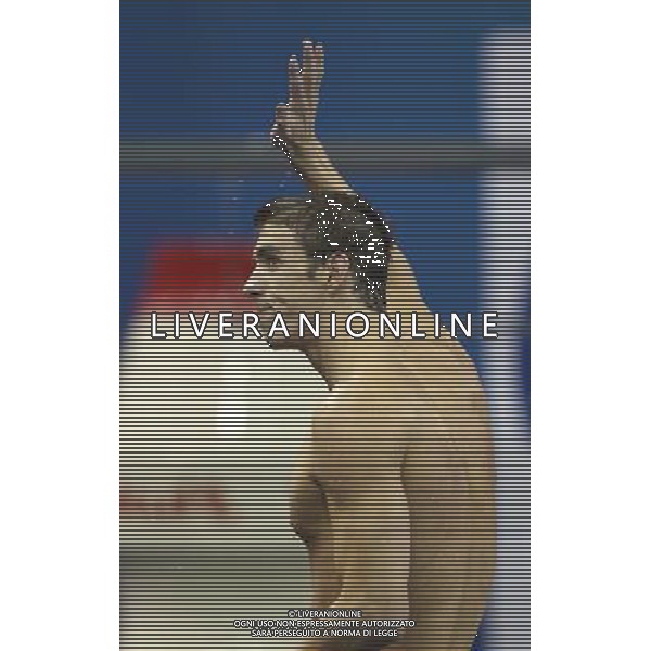 (110730) -- SHANGHAI, July 30, 2011 () -- Michael Phelps of the United States waves to spectators after the final of men\'s 100m butterfly swimming event at the 14th FINA World Championships in Shanghai, east China, July 30, 2011. Michael Phelps claimed the title with 50.71. (/Fan Jun) (zgp)