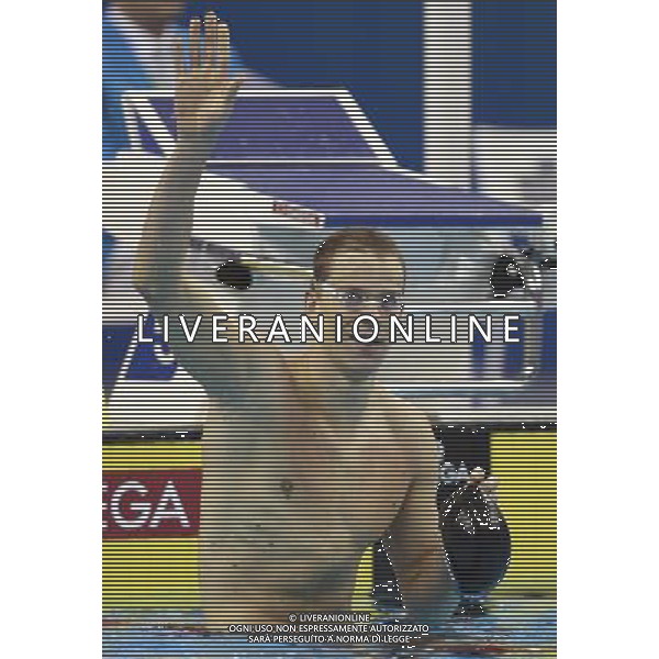 (110730) -- SHANGHAI, July 30, 2011 () -- Cesar Cielo Filho of Brazil celebrates after the final of men\'s 50m freestyle swimming event at the 14th FINA World Championships in Shanghai, east China, July 30, 2011. Cesar Cielo Filho of Brazil claimed the title with 21.52. (/Fan Jun) (zgp)