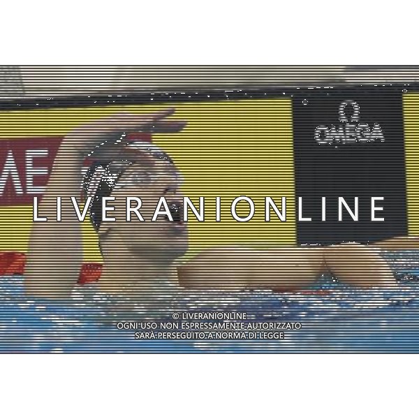 (110730) -- SHANGHAI, July 30, 2011 () -- Cesar Cielo Filho of Brazil celebrates after the final of men\'s 50m freestyle swimming event at the 14th FINA World Championships in Shanghai, east China, July 30, 2011. Cesar Cielo Filho of Brazil claimed the title with 21.52. (/Fan Jun) (zgp)