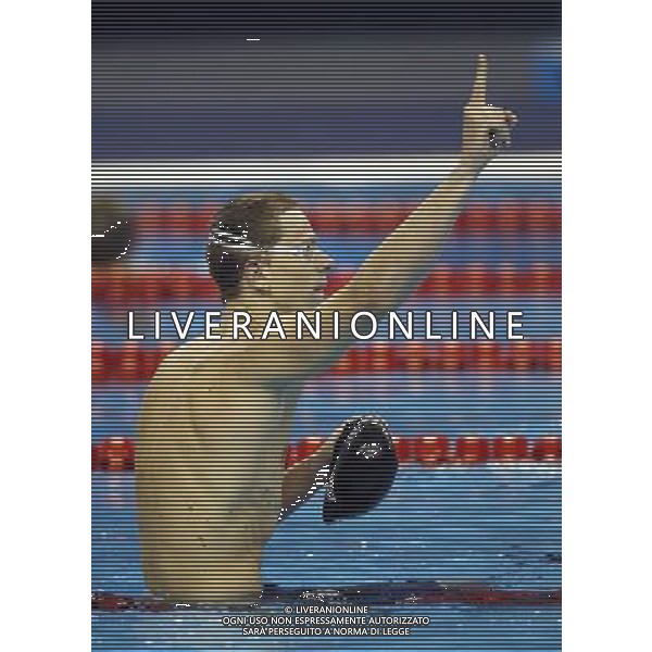 (110730) -- SHANGHAI, July 30, 2011 () -- Cesar Cielo Filho of Brazil celebrates after the final of men\'s 50m freestyle swimming event at the 14th FINA World Championships in Shanghai, east China, July 30, 2011. Cesar Cielo Filho of Brazil claimed the title with 21.52. (/Fei Maohua) (zgp)