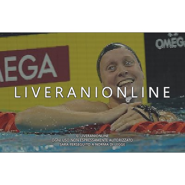 (110730) -- SHANGHAI, July 30, 2011 () ®C Inge Dekker of the Netherlands reacts after the final of women\'s 50m butterfly swimming event at the 14th FINA World Championships in Shanghai, east China, July 30, 2011. Inge Dekker of the Netherlands claimed the title with 25.71. (/Yang Zongyou) (zgp)