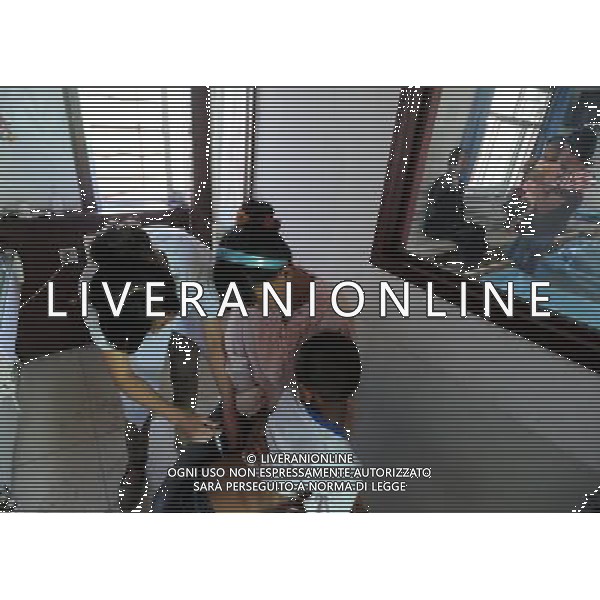 (110802) -- LANZHOU, Aug. 2, 2011 () -- A boy is given an injection in a clinic of Tongyi Village, Liangzhou District, Wuwei City, northwest China\'s Gansu Province, July 29, 2011. On July 29 in a village clinic, Chang Faguo, 70, of the Luzhou village, receives herbal drugs from doctor Zhang Yuwen of Ma\'er Village neighbouring Luzhou and then rides home. Luzhou, located in the Wuwei City\'s Liangzhou District in northwest China\'s Gansu Province, is one of the impoverished villages in the poor province. Herbal drugs are very common in Liangzhou where most of the village doctors are skillful at the Traditional Chinese Medicine (TCM). \'Compared with Western medicines, herbal drugs are really cheap for farmers, especially in treating chronic diseases,\' Zhang said, \'take Chang for example, he needs a long-term medication as he has suffered from chronic stomach disease for nearly 20 years. Conventional chemical drugs will cost him 24 RMB yuan every two days whereas the TCM herbs only need 14 RMB yuan. Saving 10 RMB yuan matters much for a famer\'s family whose annual income is merely 5,000 RMB yuan.\' After the founding of the People\'s Republic of China in 1949, rural people had access to subsidized health clinics run by \'barefoot doctors,\' who were basically middle-school students trained in first aid. Those \'barefoot doctors\' used to prescribe herbs to treat diseases for farmers, which were common and easy to obtain in the countryside. The primitive service, essentially free, played a role in doubling the country\'s average life expectancy from 35 years in 1949 to 68 years in 1978. When China began its economic reform in the early 1980s, the system was dismantled as the country attempted to switch to a market-oriented healthcare system. But the government failed to establish a viable substitute, leaving its large rural population without health insurance. A national health survey in 2003 revealed about 73 percent of people in rural areas who should have sought m