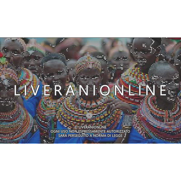 (110803) -- NAIROBI, Aug. 3, 2011 () -- Samburu women sing a song in Isiolo in the north of Kenya, July 29, 2011. The Samburu tribe lives in the north of Kenya. The word \'Samburu\' means \'butterfly\' in the language of Masai as their traditional clothes are striking with colorful beaded necklaces, earrings and bracelets. (/Zhao Yingquan) (zw)
