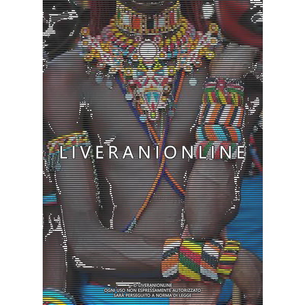 (110803) -- NAIROBI, Aug. 3, 2011 () -- A Samburu warrior is seen in Isiolo in the north of Kenya, July 29, 2011. The Samburu tribe lives in the north of Kenya. The word \'Samburu\' means \'butterfly\' in the language of Masai as their traditional clothes are striking with colorful beaded necklaces, earrings and bracelets. (/Zhao Yingquan) (zw)