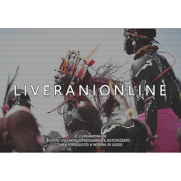(110803) -- NAIROBI, Aug. 3, 2011 () -- Samburu warriors dance in Isiolo in the north of Kenya, July 29, 2011. The Samburu tribe lives in the north of Kenya. The word \'Samburu\' means \'butterfly\' in the language of Masai as their traditional clothes are striking with colorful beaded necklaces, earrings and bracelets. (/Zhao Yingquan) (zw)