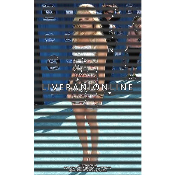 Ashley Tisdale Photo by Gilbert Flores \'Phineas And Ferb: Across The 2nd Dimension\' Los Angeles Premiere at the El Captian Theatre August 3, 2011 - Hollywood, California
