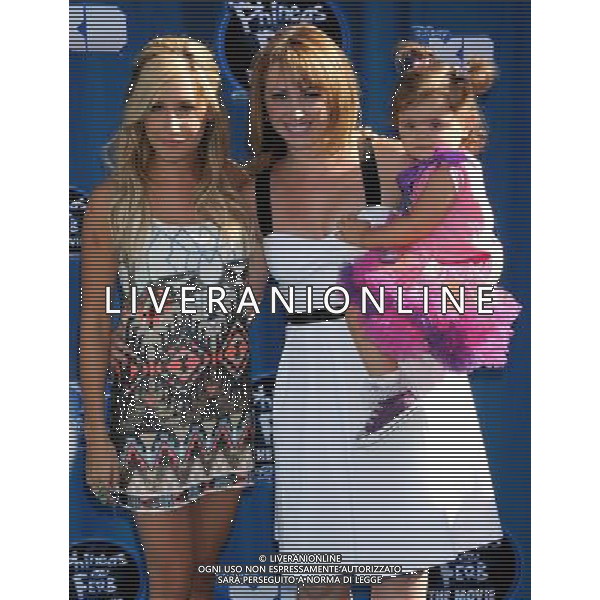 Ashley Tisdale and sister Photo by Gilbert Flores \'Phineas And Ferb: Across The 2nd Dimension\' Los Angeles Premiere at the El Captian Theatre August 3, 2011 - Hollywood, California