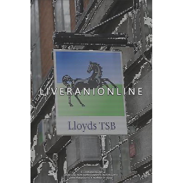 The cost of compensating customers who were mis-sold payment protection insurance pushed Lloyds to a £3.3bn loss for the six months to 30 June.