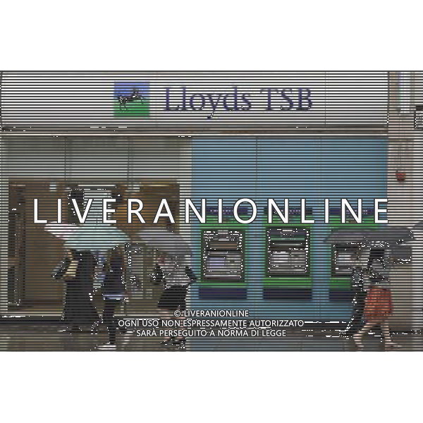 The cost of compensating customers who were mis-sold payment protection insurance pushed Lloyds to a £3.3bn loss for the six months to 30 June.