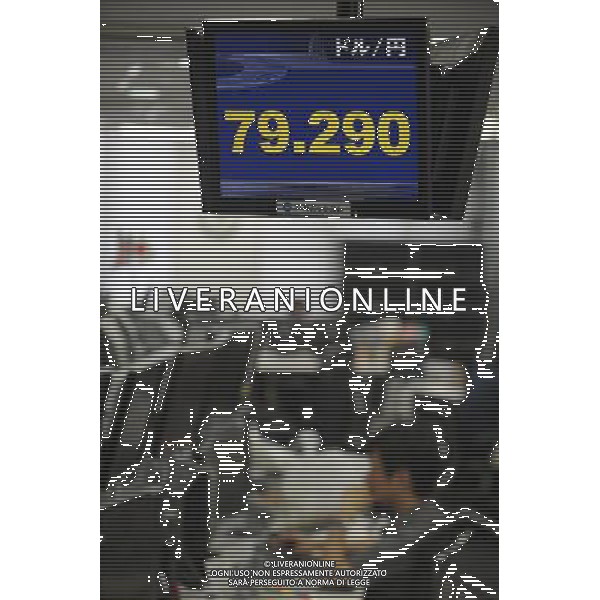 (110804) -- TOKYO, Aug. 4, 2011 () -- Photo taken on Aug. 4, 2011 shows an electronic board displaying foreign exchange rates in Tokyo. Japan intervened in the currency market on Thursday to stem yen\'s appreciation against the U.S. dollar, Finance Minister Yoshihiko Noda said. (/Kenichiro Seki) (zx)
