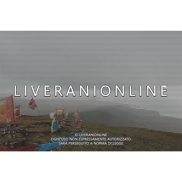 (110805) -- MADUO, Aug. 5, 2011 () -- Photo taken on Aug. 3, 2011 shows the black clouds over the Gyaring Lake, northwest China\'s Qinghai Province. The sister lakes Gyaring Lake and Ngoring Lake are two largest freshwater lakes on the main stream of the Yellow River, affecting the function of adjusting water volume. With the progress of environmental protection and development of nature preservation zone of the Three River Sources, the areas of the sister lakes have enlarged each 31.76 square kilometers and 59.46 square kilometers in recent years. (/Wu Guangyu) (dtf)