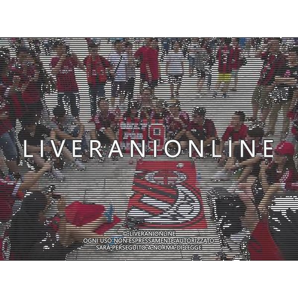 Supercoppa TIM Cup 2011 Milan-Inter Pechino (Cina) - 06.08.2011 Milan-Inter Nella Foto:Tifosi Milan e Inter fuori lo stadio /Ph.Vitez-Ag. Aldo Liverani