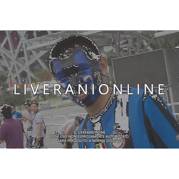 Supercoppa TIM Cup 2011 Milan-Inter Pechino (Cina) - 06.08.2011 Milan-Inter Nella Foto:Tifosi Milan e Inter fuori lo stadio /Ph.Vitez-Ag. Aldo Liverani