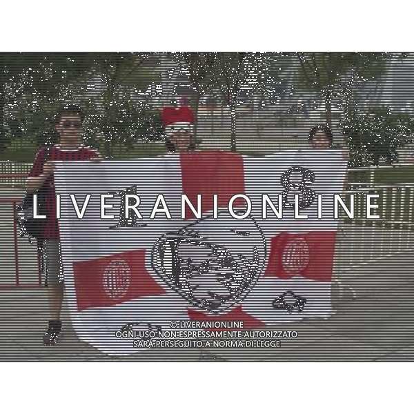 Supercoppa TIM Cup 2011 Milan-Inter Pechino (Cina) - 06.08.2011 Milan-Inter Nella Foto:Tifosi Milan e Inter fuori lo stadio /Ph.Vitez-Ag. Aldo Liverani