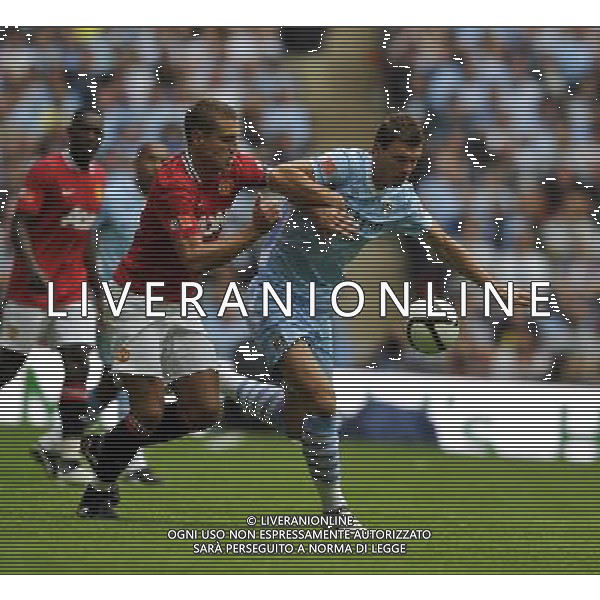©© Sean Ryan /IPS/© Sean Ryan /IPS/MAXPPP - 07/08/2011 ; London ; UK - Edin Dzeko of Manchester City (R) tackes Nemanja Vidic of Manchester United (L)..Manchester City v Manchester United.FA Community Shield.Wembley Stadium, London, .7/08/11 .Photo by Sean Ryan.mobile 07971 400939 .(IPS PHOTO AGENCY) - 21 Delisle Road - London .SE28 0JD- office tel: 0208331 0207 ******************* UK OUT *******************