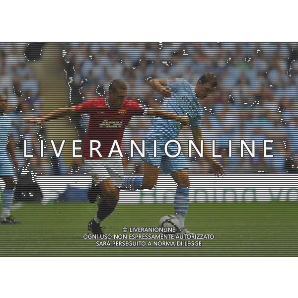 ©© Sean Ryan /IPS/© Sean Ryan /IPS/MAXPPP - 07/08/2011 ; London ; UK - Edin Dzeko of Manchester City (R) tackes Nemanja Vidic of Manchester United (L)..Manchester City v Manchester United.FA Community Shield.Wembley Stadium, London, .7/08/11 .Photo by Sean Ryan.mobile 07971 400939 .(IPS PHOTO AGENCY) - 21 Delisle Road - London .SE28 0JD- office tel: 0208331 0207 ******************* UK OUT *******************