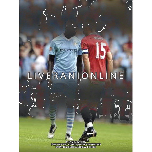 ©© Sean Ryan /IPS/© Sean Ryan /IPS/MAXPPP - 07/08/2011 ; London ; UK - Mario Balotelli of Manchester City talks to Stefan Savic of Manchester City..Manchester City v Manchester United.FA Community Shield.Wembley Stadium, London, .7/08/11 .Photo by Sean Ryan.mobile 07971 400939 .(IPS PHOTO AGENCY) - 21 Delisle Road - London .SE28 0JD- office tel: 0208331 0207 ******************* UK OUT *******************