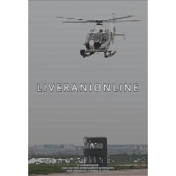 (110808) -- SHANGHAI, Aug. 8, 2011 () -- A police helicopter prepares to land at a parking apron in Shanghai, east China, Aug. 8, 2011. Shanghai police have launched a daily air inspection on the traffic condition of three major highways. The inspection would be conducted by helicopters for four hours a day over the highways that respectively link Beijing and Shanghai, Shanghai and Kunming, as well as Shenyang and Haikou. The move aims at detecting congestion and providing real-time traffic information to citizens, as well as capturing traffic-violating behaviors as early as possibly. (/Fan Jun) (llp)