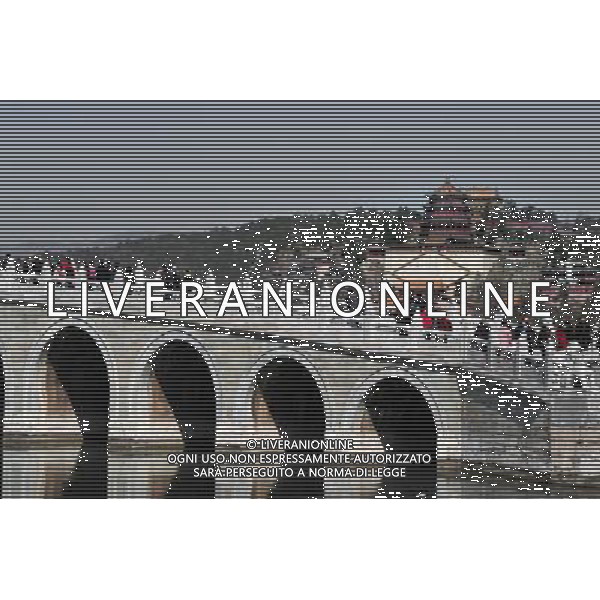 Beijing also formerly known in English as Peking is a metropolis in northern China and the capital of the People\'s Republic of China. It is one of the four municipalities of the PRC, which are equivalent to provinces in China\'s administrative structure. The municipality of Beijing borders Hebei Province to the north, west, south, and for a small section in the east, and Tianjin Municipality to the southeast. Beijing is one of the Four Great Ancient Capitals of China. Beijing is China\'s second largest city, after Shanghai. Beijing is a major transportation hub, with dozens of railways, roads and motorways passing through the city. It is also the focal point of many international flights to China. Beijing is recognized as the political, educational, and cultural center of the People\'s Republic of China, while Shanghai and Hong Kong predominate in economic fields. The city hosted the Games. Few cities in the world besides Beijing have served as the political and cultural centre of an area as immense as China for so long. The Encyclopedia Britannica describes it as, \'One of the world\'s great cities,\' and declares that the city has been an integral part of China‚Äôs history for centuries, and there is scarcely a major building of any age in Beijing that doesn\'t have at least some national historical significance. Beijing is renowned for its opulent palaces, temples, and huge stone walls and gates. Its art treasures and universities have long made the city a centre of culture and art in China.