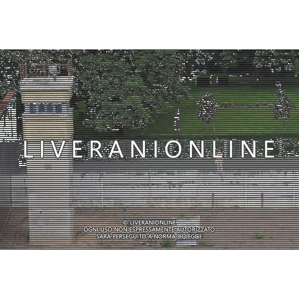(110810) -- BERLIN, August 10, 2011 () -- A tourist makes picture at a former Watchtower over so called \'Dead Strip\' on the Berlin Wall at Bernauer street in Berlin, capital of Germany on August 4, 2011. Berlin is marking the 50th anniversary of the Berlin Wall, which started building on August 13, 1961. (/Ma Ning).