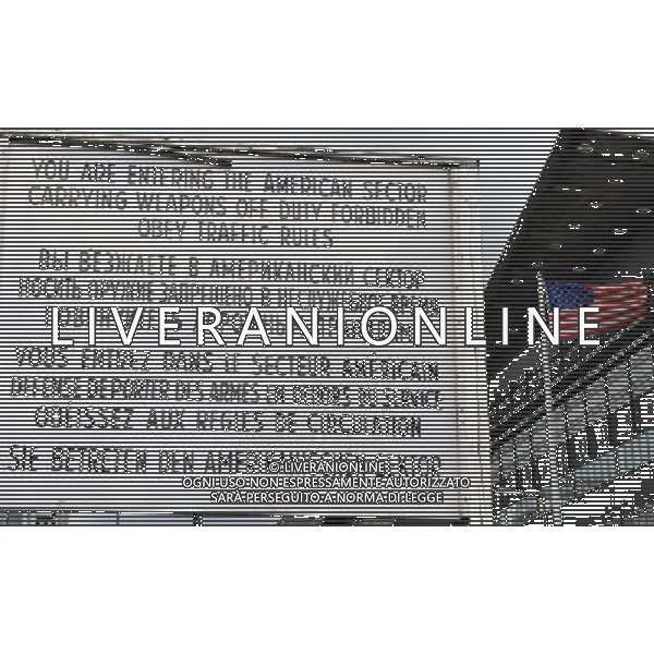 (110810) -- BERLIN, August 10, 2011 () -- Picture shows the advicing board to enter the US controlled sector at Chekpoint Charlie, a former checkpoint to cross Berlin Wall in Berlin, capital of Germany on August 8, 2011. Berlin is marking the 50th anniversary of the Berlin Wall, which started building on August 13, 1961. (/Ma Ning)