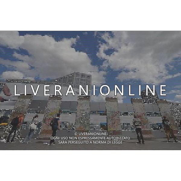 (110810) -- BERLIN, August 10, 2011 () -- People watch an exhibition of the Berlin Wall at Potsdamer Platz in Berlin, capital of Germany on August 8, 2011. Berlin is marking the 50th anniversary of the Berlin Wall, which started building on August 13, 1961. (/Ma Ning)